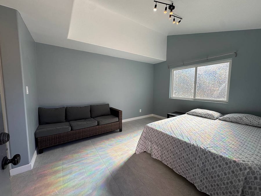 Unit A.
Bedroom with queen bed
