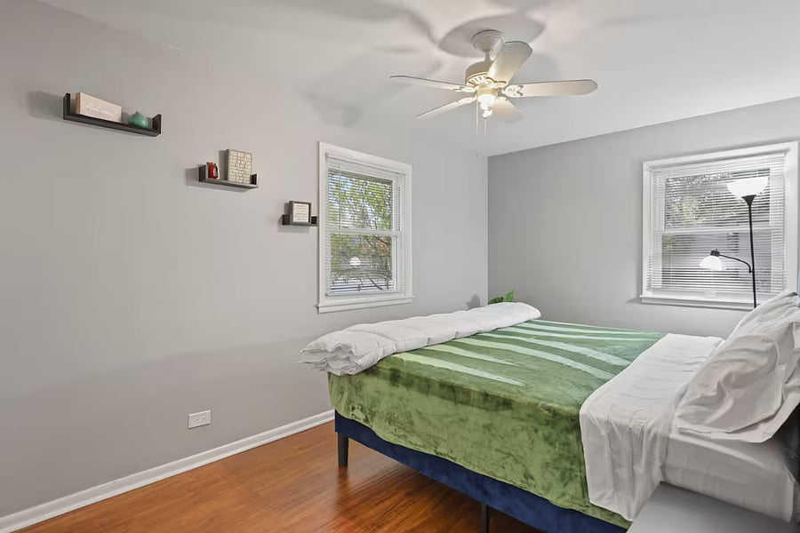 Bedroom 2 with queen size bed and closet space.