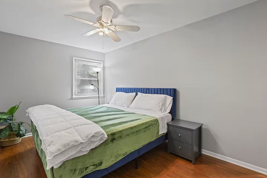 Bedroom 2 with queen size bed and closet space.