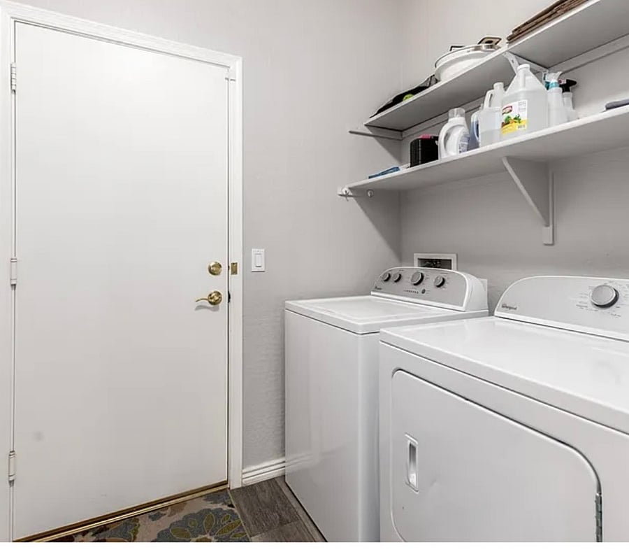 Laundry room leading to the garage