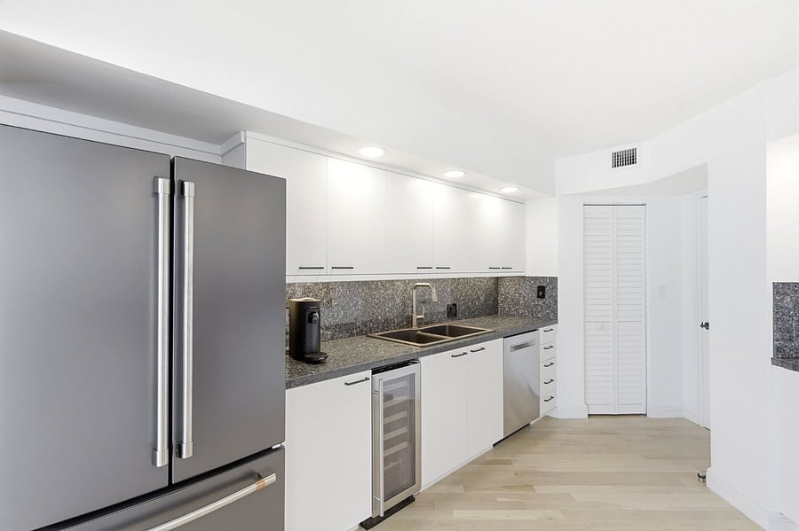 Top of the line full kitchen with stainless steel appliances... Including a wine fridge. 