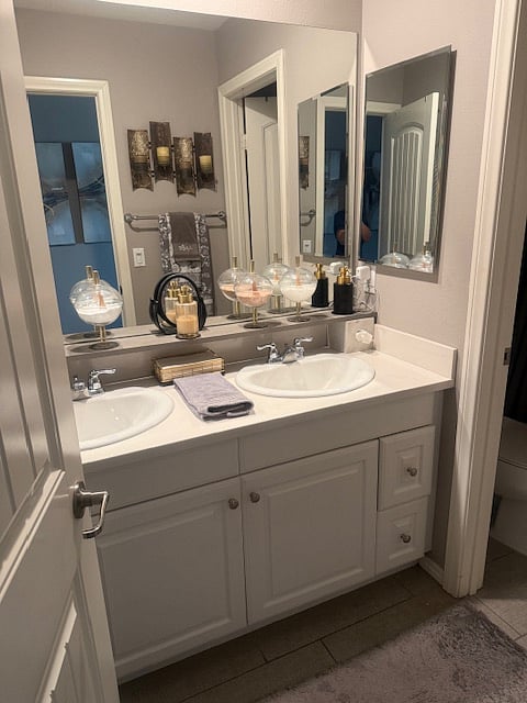 Your private bathroom w/double vanity - towels and luxury bath & body products provided