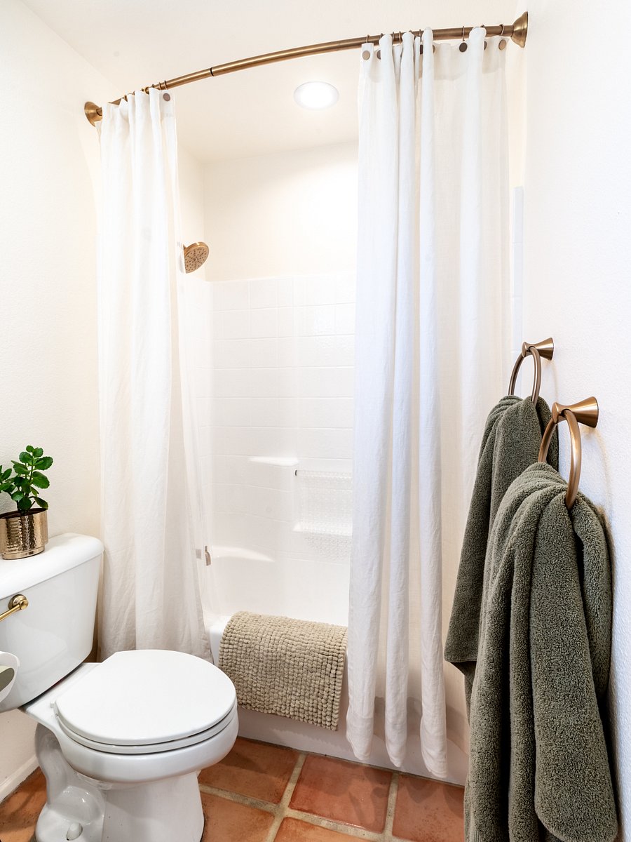 Clean and refreshed full bath (shower over tub). 