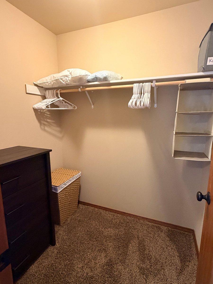 Walk-in closet for primary bedroom