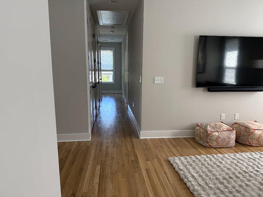 Upstairs hallway to private bedroom and bathroom