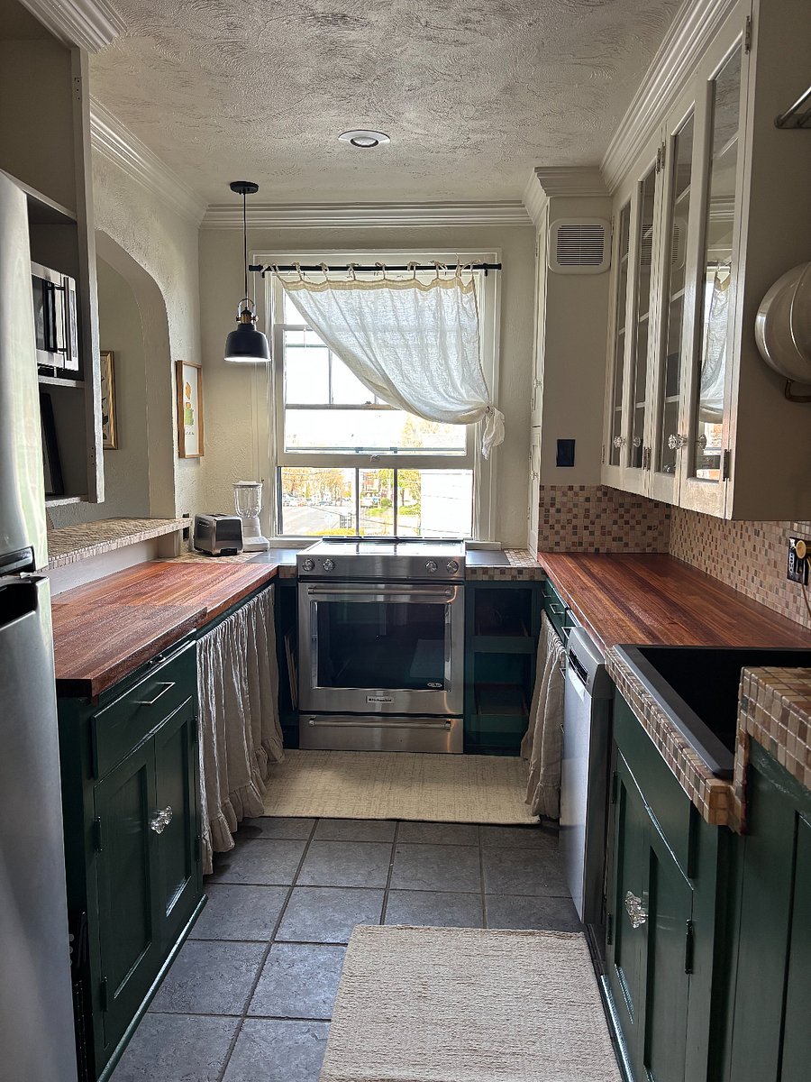 Full kitchen with oven/stove, full refrigerator, coffee maker, blender, microwave, dishwasher, plates, utensils, pots & pans