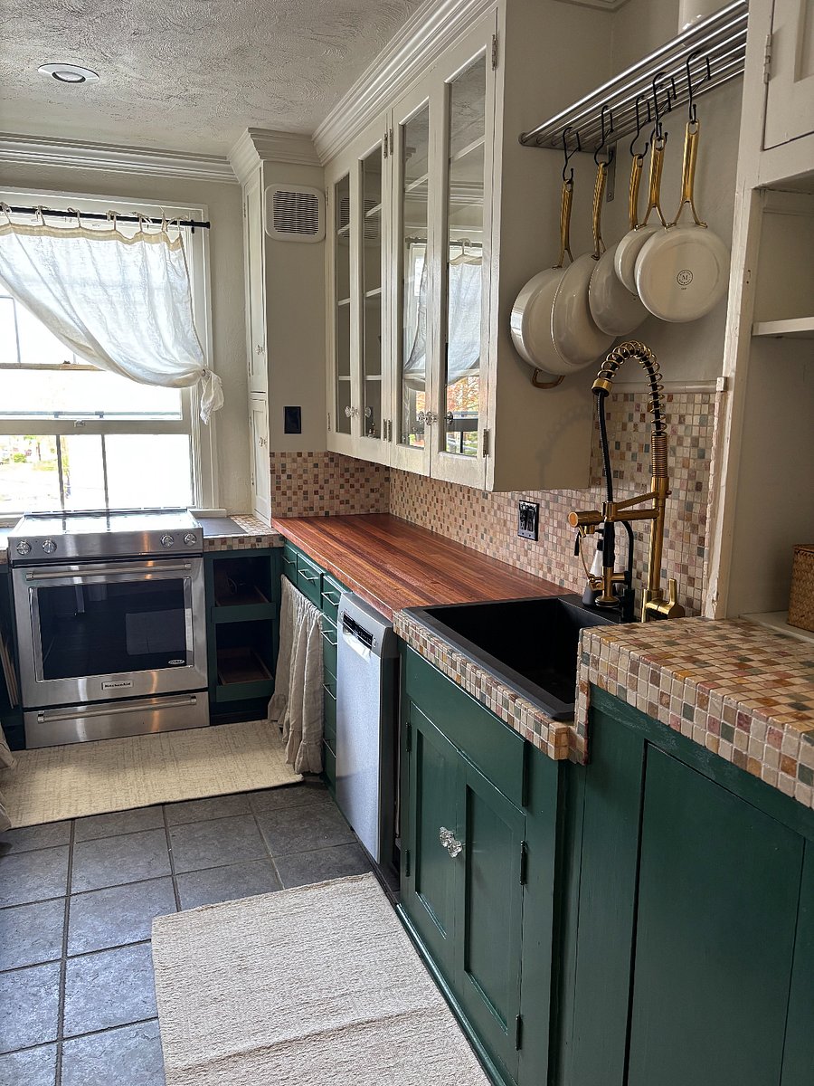 Full kitchen with oven/stove, full refrigerator, coffee maker, blender, microwave, dishwasher, plates, utensils, pots & pans