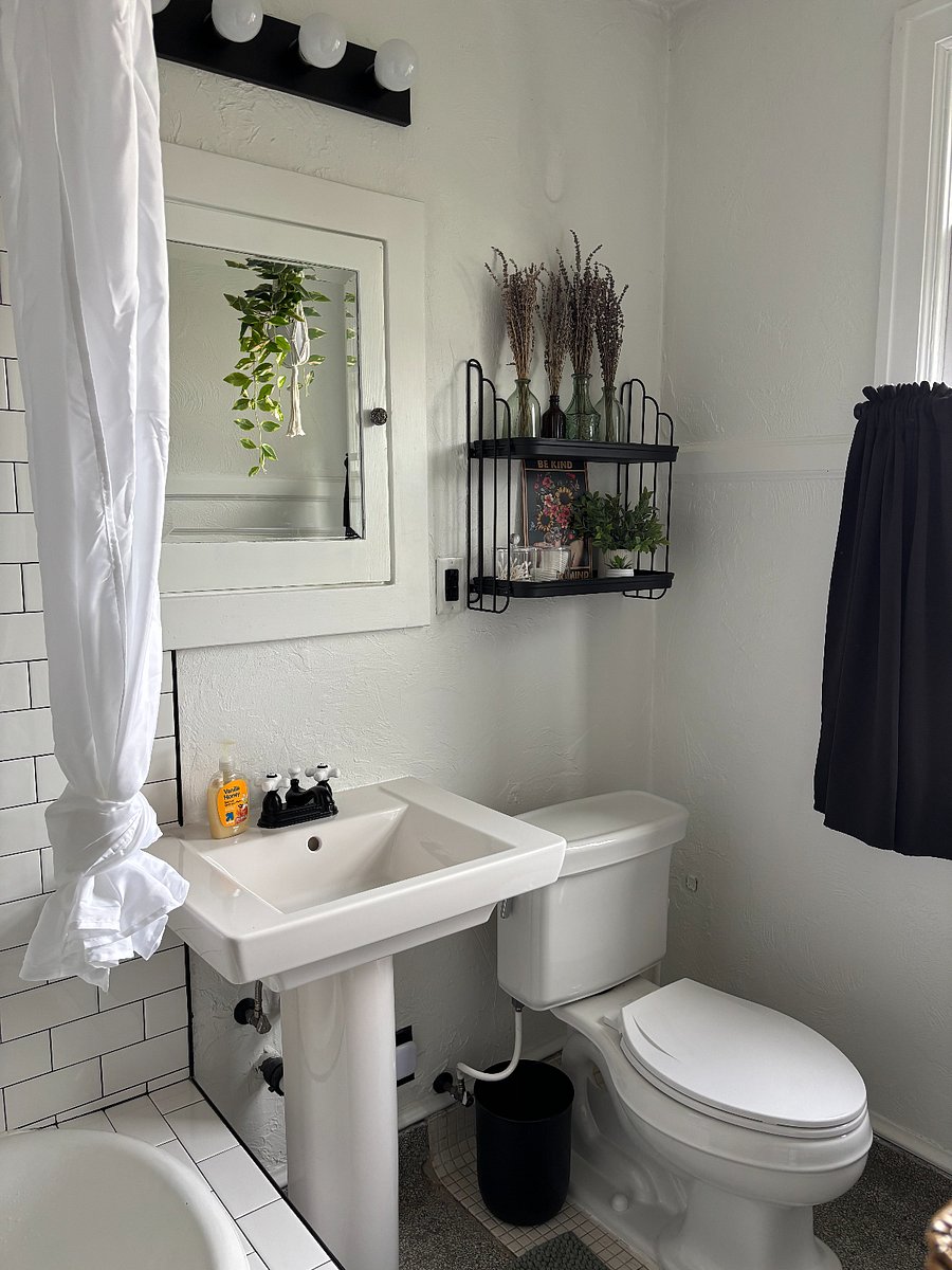Newly renovated bathroom with bathtub / shower and in-unit washer & dryer