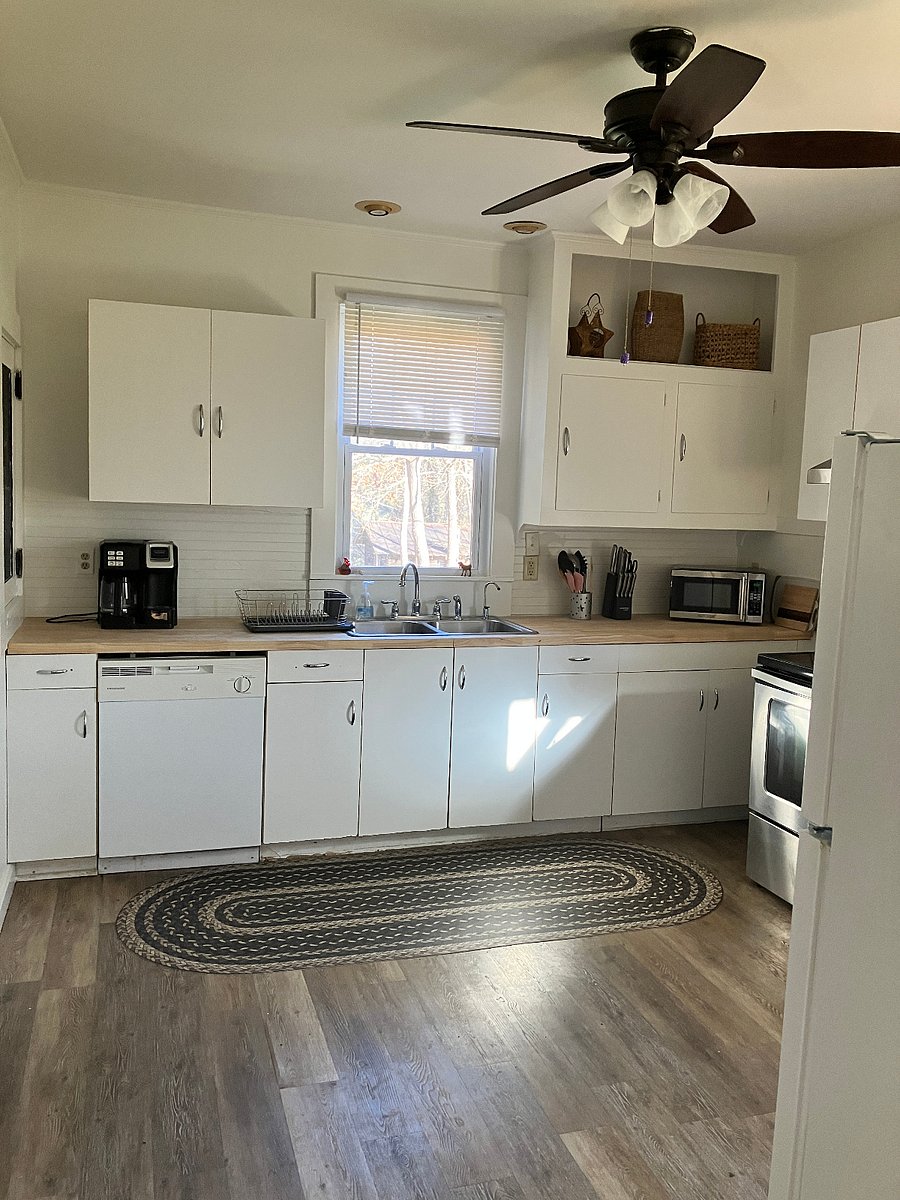Large, well-equipped kitchen with lots of counter space and storage.