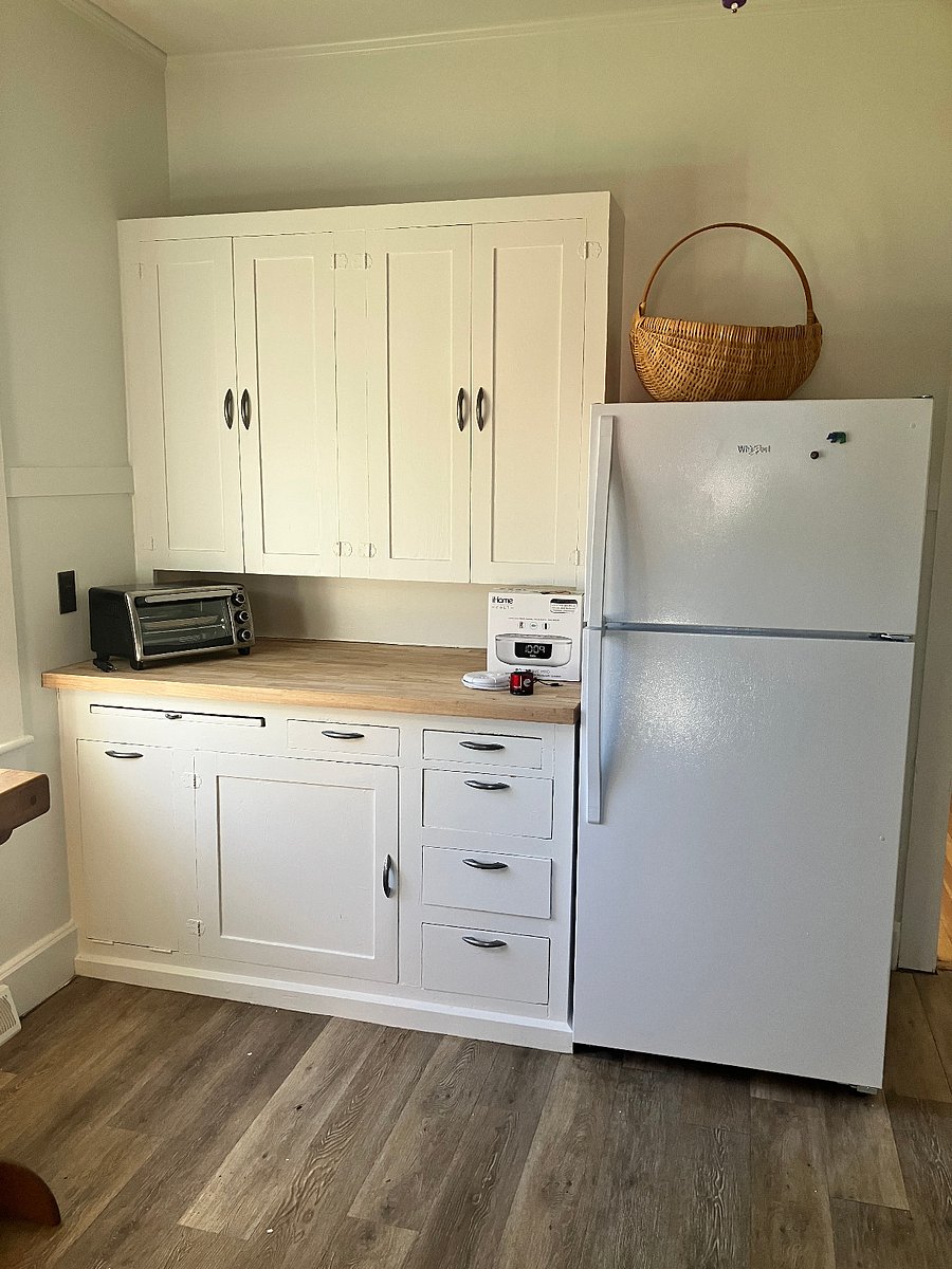Toaster oven, refrigerator, and yes, more storage. Note, fridge does not have an icemaker.