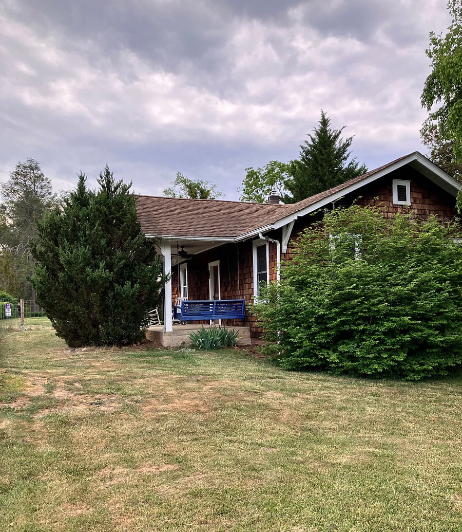Side view. We're in a drought so the yard is a little parched. 