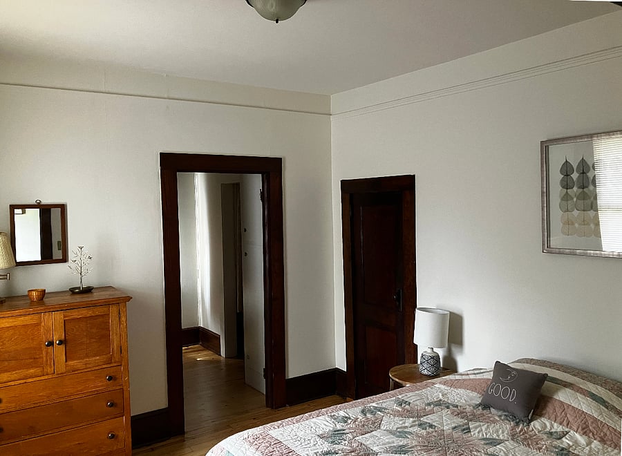 The second bedroom is immediately to the left when you come in the front door. It has a small closet, and a large closet in the extra room off to the side. 