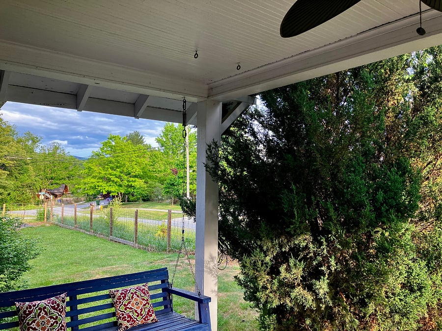 From the from porch, looking east. The cedar tree provides privacy from the street.
