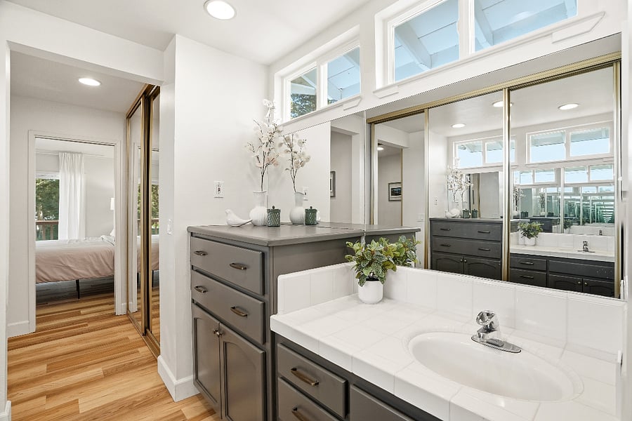 Huge primary bath upstairs with dual sinks and tons of storage/closet space