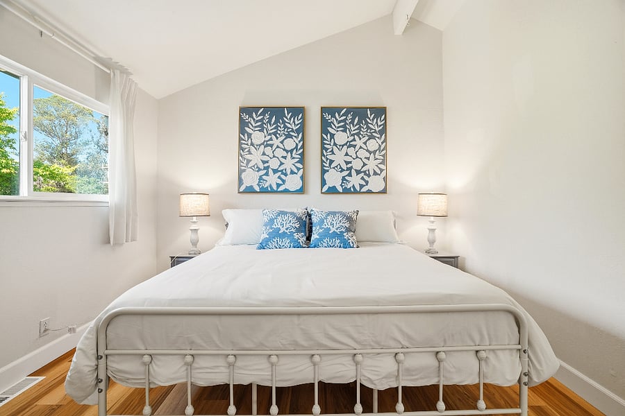 Upstairs white room with New King bed and dresser