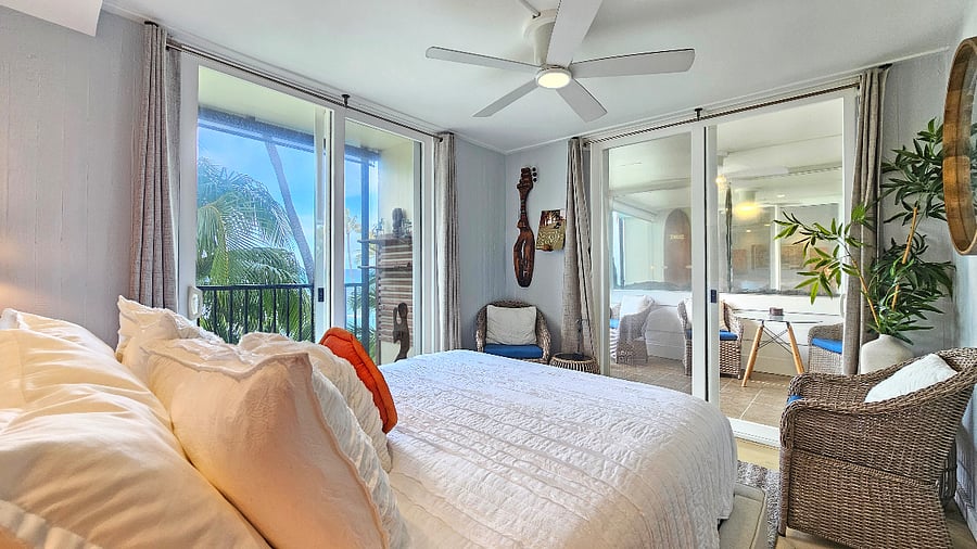 Master bedroom with view of two balconies