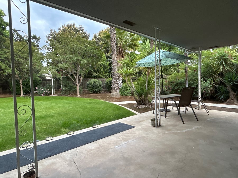 Spacious backyard with seating area