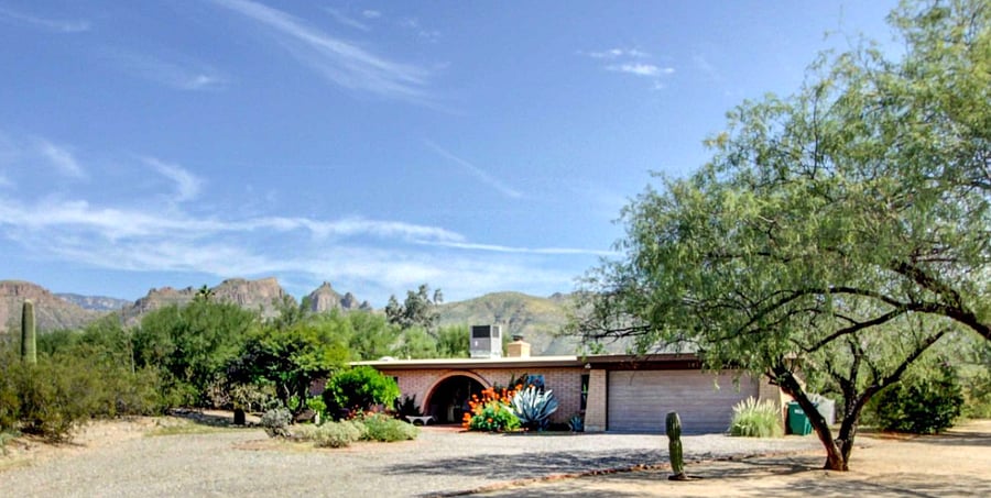Serene desert setting with mountain views in a quiet neighborhood.