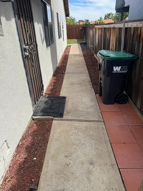 Trash cans located behind the gate.  2nd Master bedroom has its own outdoor entry / exit.