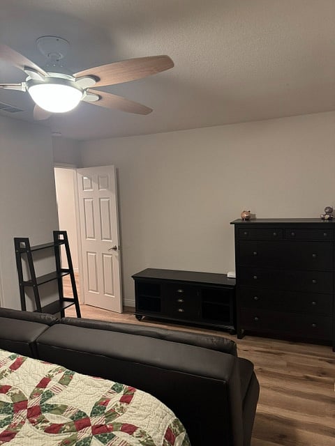 3rd Bedroom - TV stand (oposite futon sofa) and large chest of drawers.  TV will be added atop the TV stand.