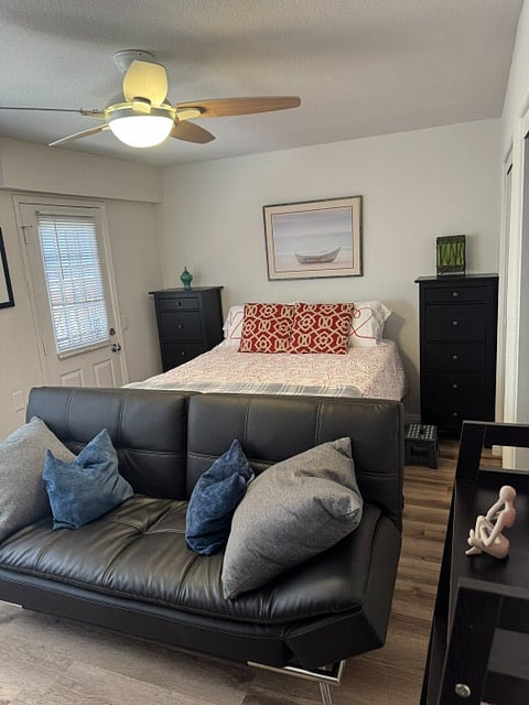 3rd Bdrm - extra long - effectively a 2nd master bedroom with its own exterior door access.