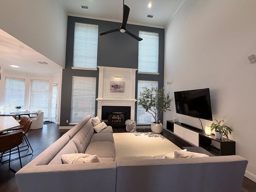 Living Room with fireplace and 75" Roku smart Tv