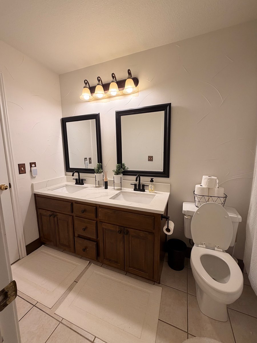 upstairs full bath with connection to room 3