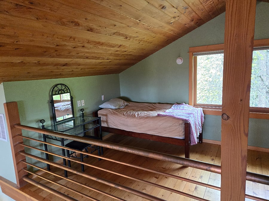 Loft bedroom with a twin bed.