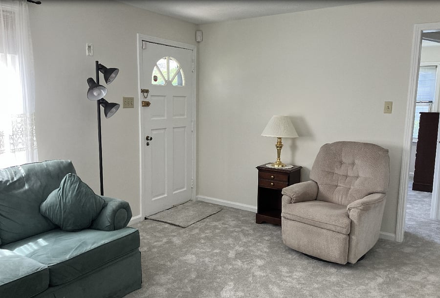 Front door entrance into living room