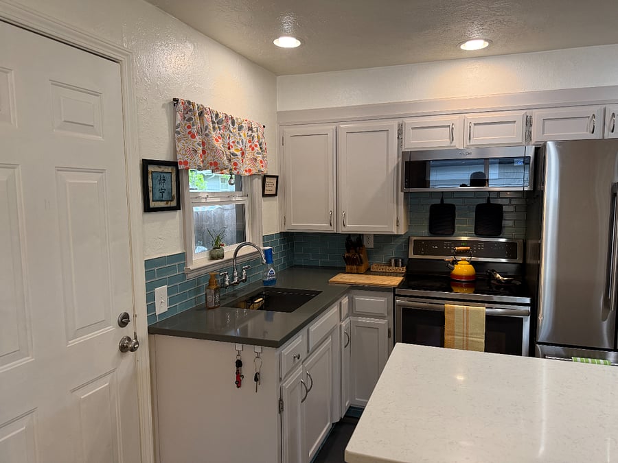 Kitchen/sink and stove area