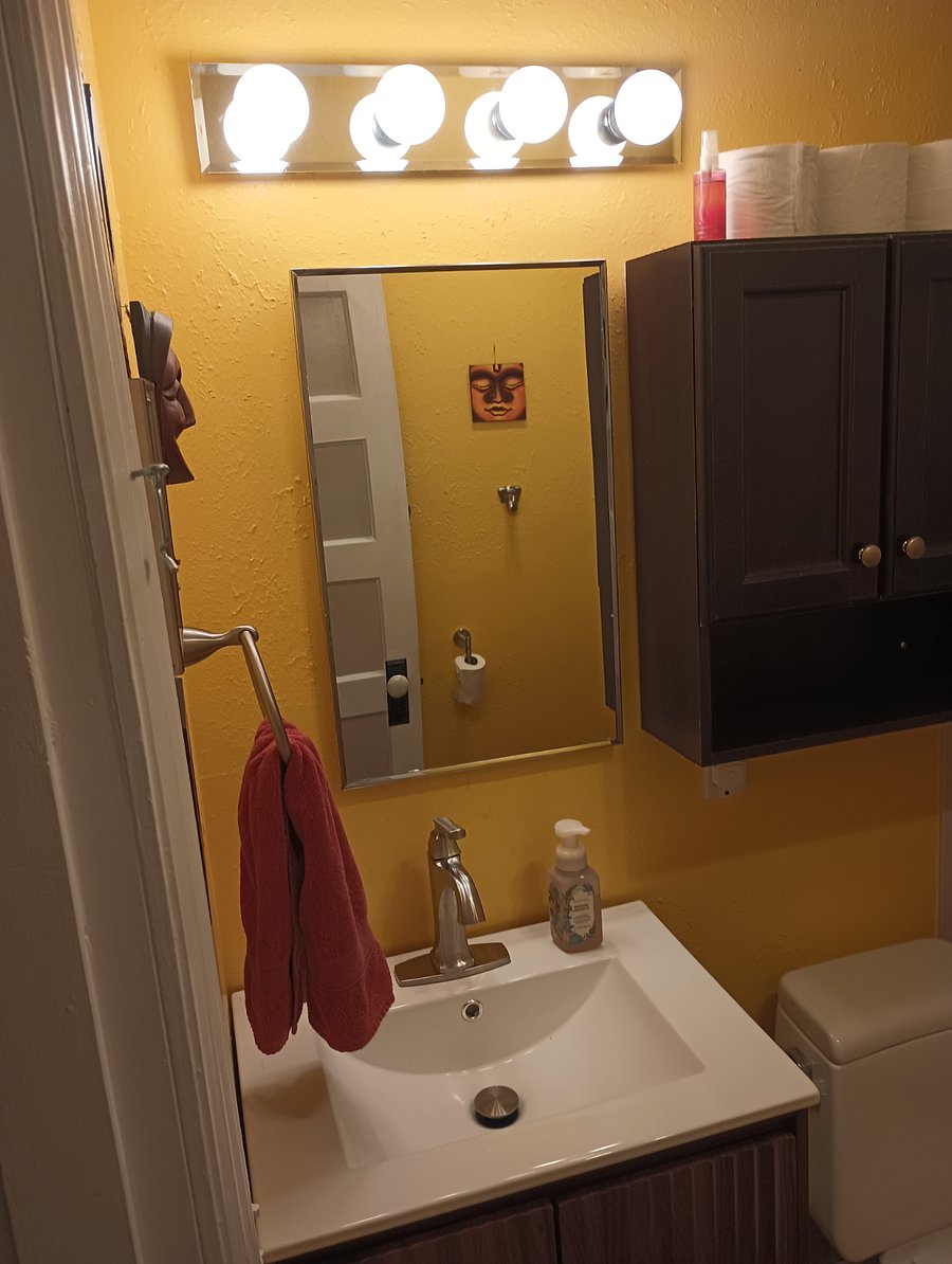 Vanity and sink in main bathroom.