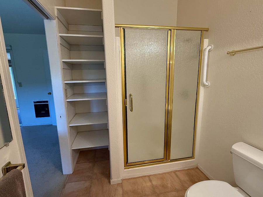 Shower and linen storage