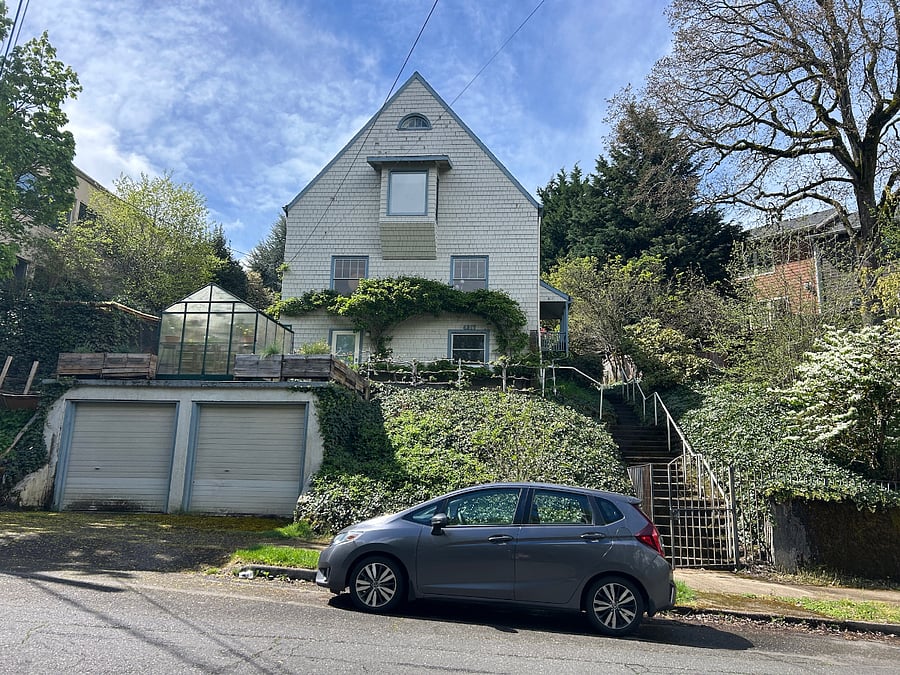 Ample street parking is available. A set of stairs leads to the units front entrance.