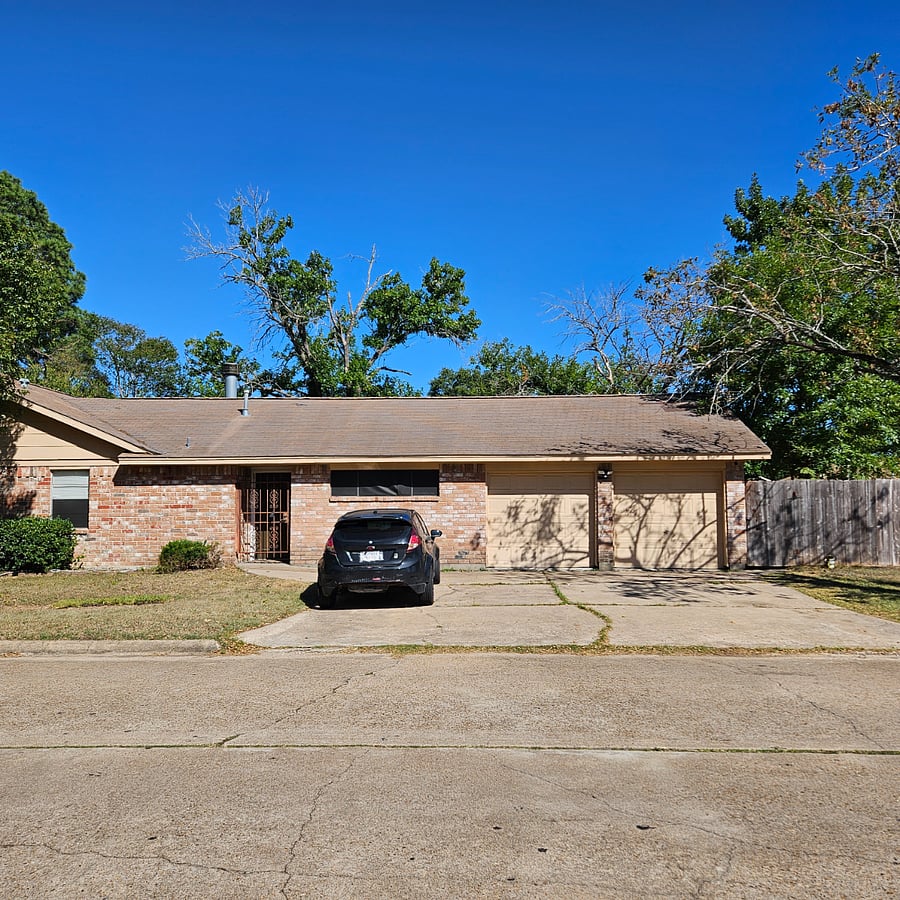 This shows the 3 car wide driveway on Mission Creek. That is the entry door to the studio. Your parking spot is where the car is, under the high windows.