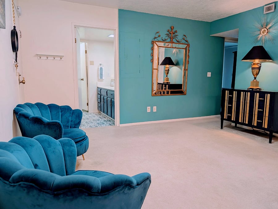 Spacious entryway with seating and storage.