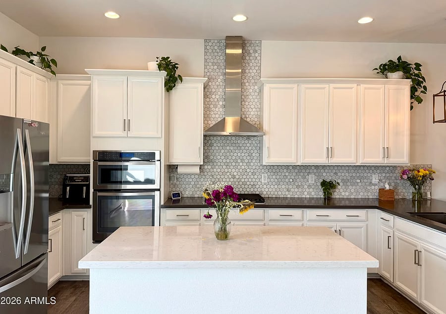 Fully equipped modern kitchen with large island and ample counter space. 

Updated appliances and everything you need for long-term stays