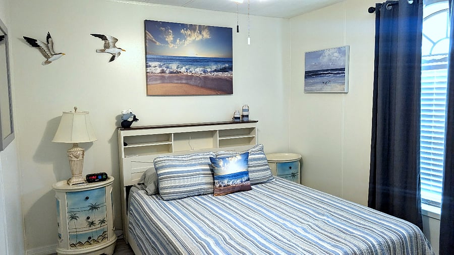second bedroom with queen bed