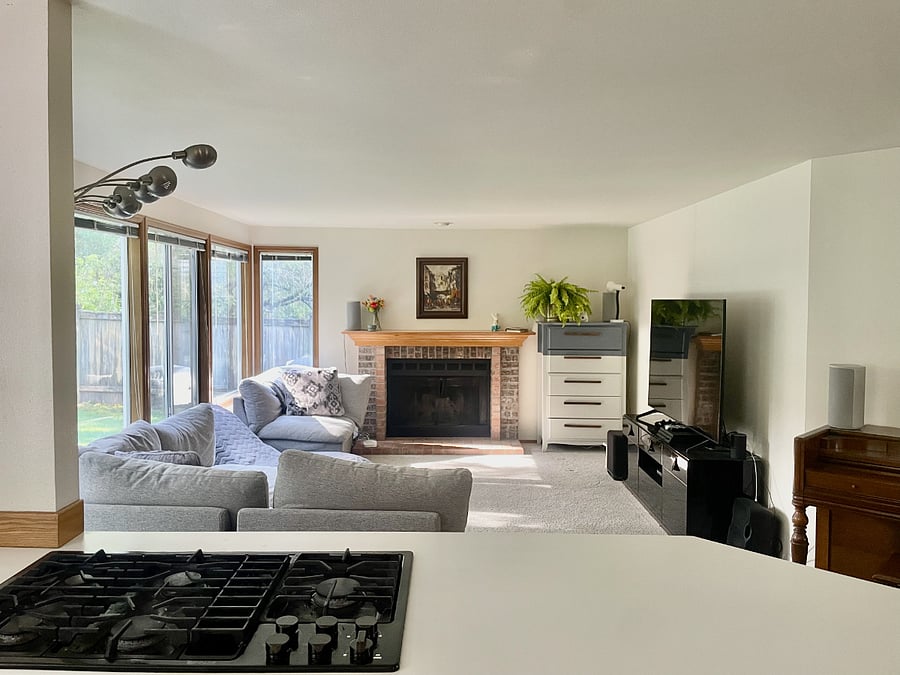 From the kitchen, you can see directly into the family room from the stove.