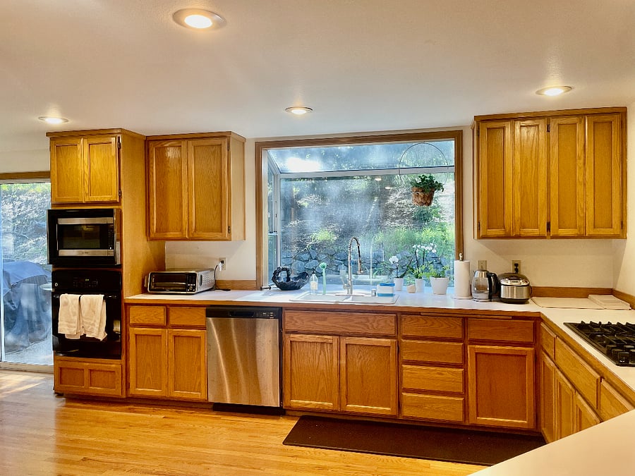 Large window directly looking into the backyard makes even meal prepping so relaxing.