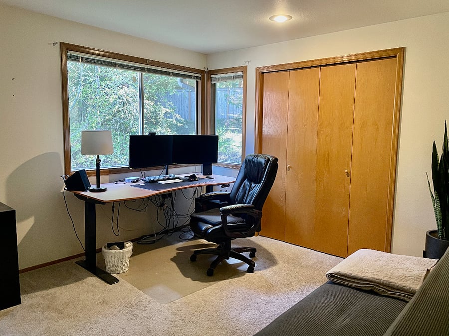 This is the office with a large standing desk and double monitors ready to plug and play.