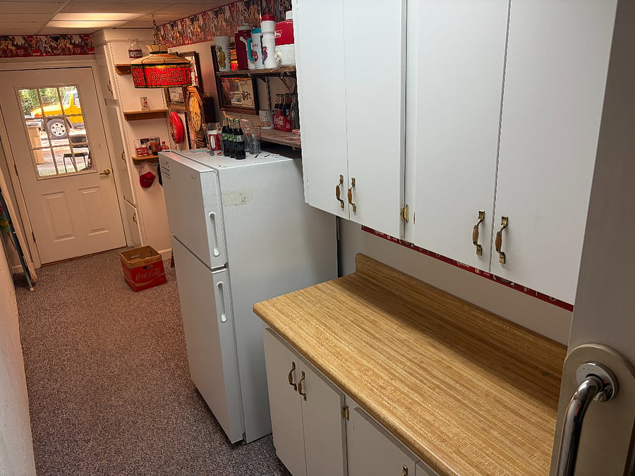 Extra pantry and refrigerator space in lower level