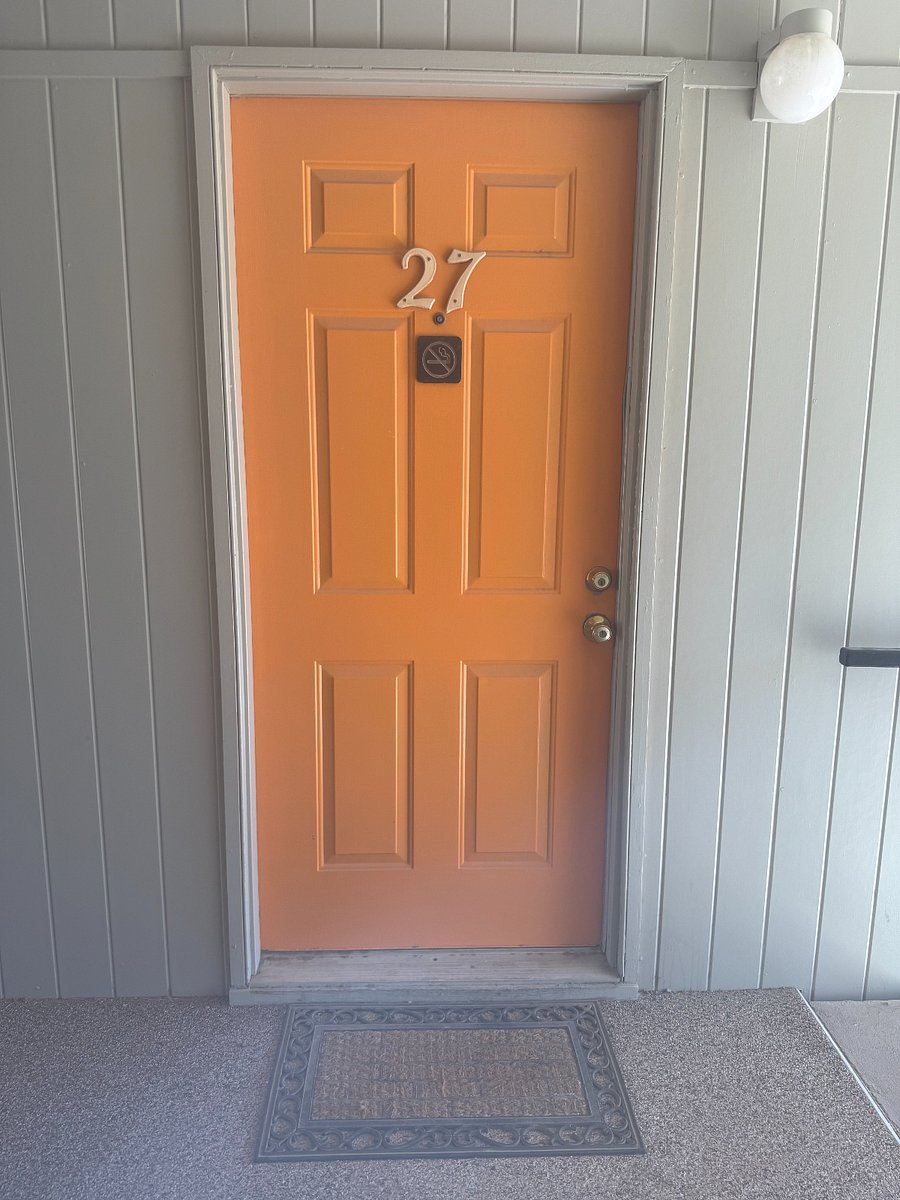 Front door with deadbolt and locking passage knob.