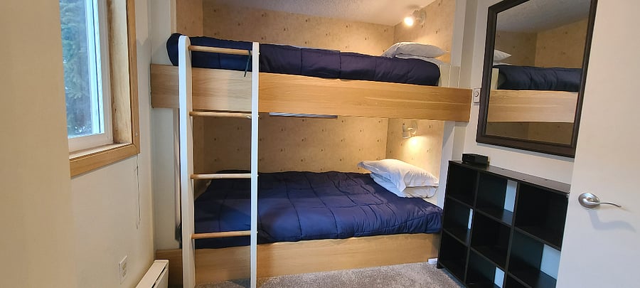 Secondary Bedroom Queen Bunkbeds with Built-In Reading Lights