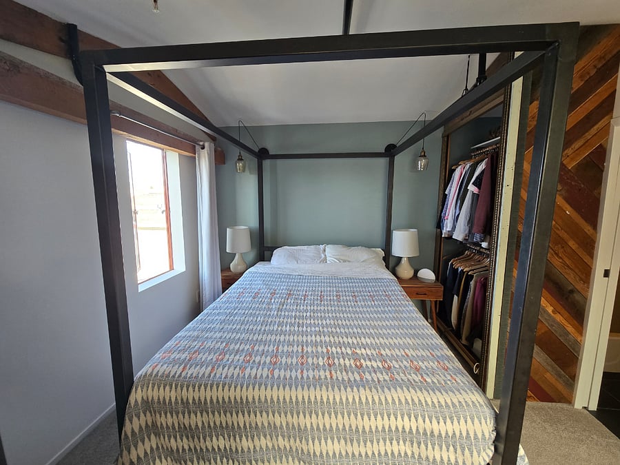 3rd Floor - Loft Bedroom, Queen Bed.  All linens provided.  2 pole custom closet with 2 shelves