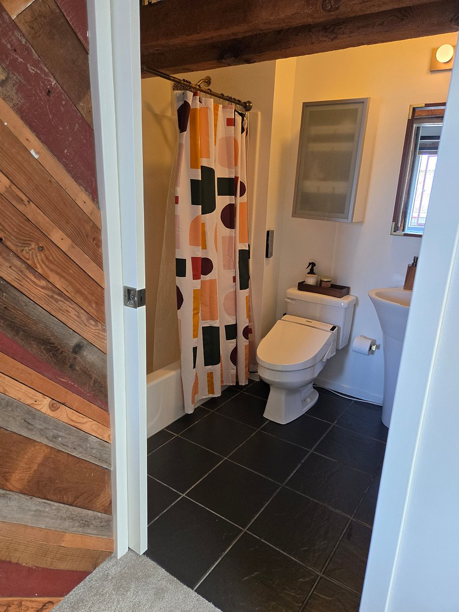 3rd Floor - full bathroom with tub/shower. large medicine cabinet for storage.
