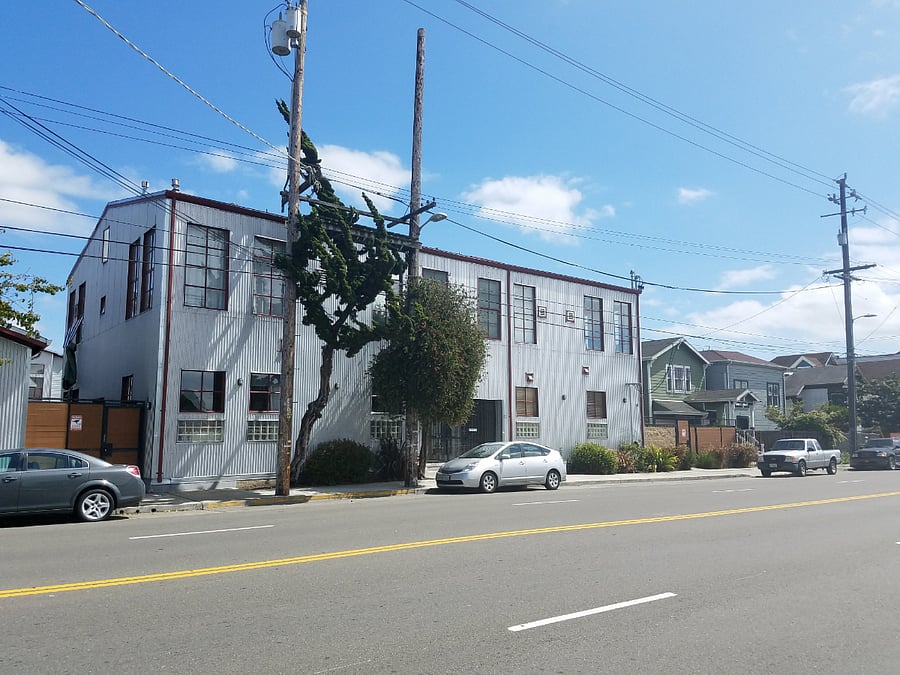 3 Story Condo unit located on Corner, with private gated entry