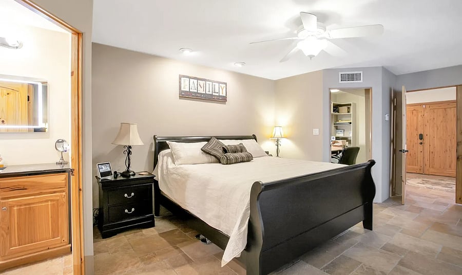 Master bedroom with queen/king bed, separate office space, walk in closet, TV