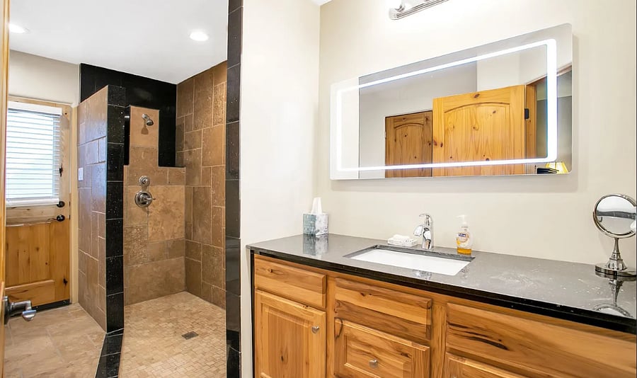 Master Bathroom with shower and walk in closet. Separate/direct access to the pool