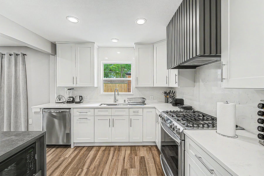 Kitchen area with windows to view outside