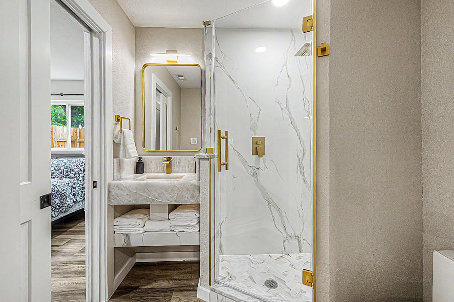 Bathroom # 3 with Porcelain shower walls